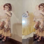 Ảnh bé gái ôm búp bê trước và sau khi khôi phục bằng AI Picsart, cho thấy khuôn mặt và búp bê sắc nét hơn.