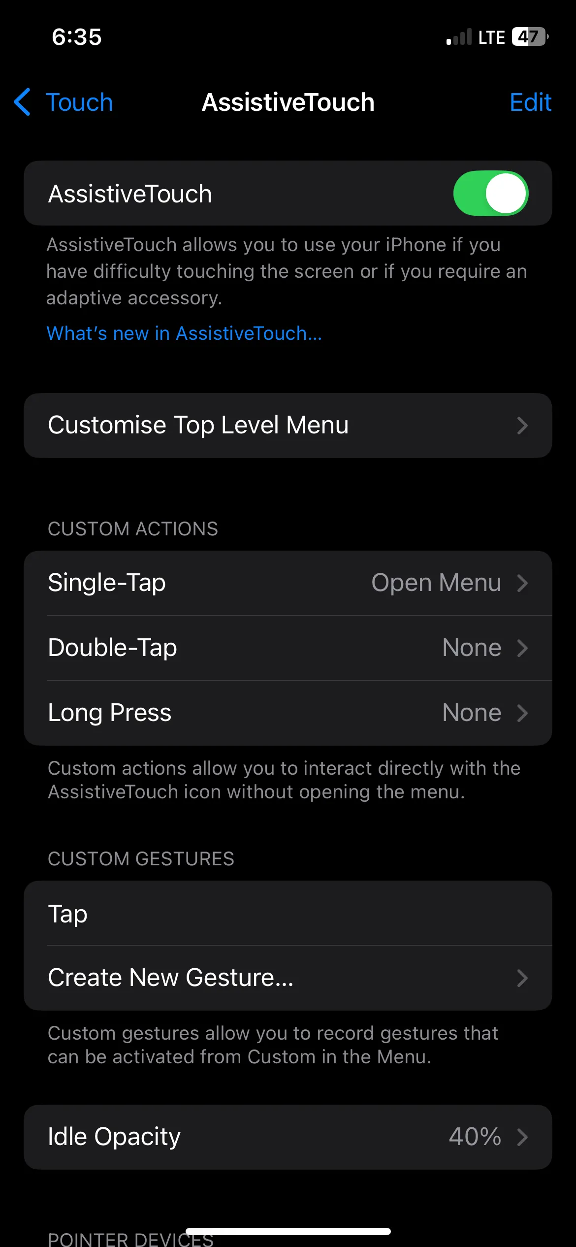 Bật tính năng AssistiveTouch (nút Home ảo) trong cài đặt Trợ năng trên iPhone.