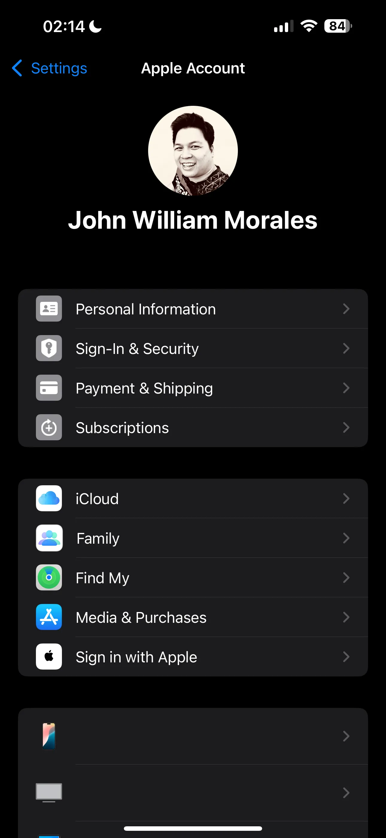 Cài đặt hồ sơ Apple ID trên iPhone hiển thị tùy chọn Phương tiện & Mục mua để kiểm tra tài khoản