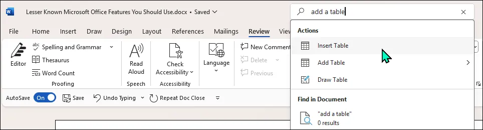 Chức năng tìm kiếm Microsoft Search trong ứng dụng Word trên Windows 11, hiển thị gợi ý lệnh "insert a table".