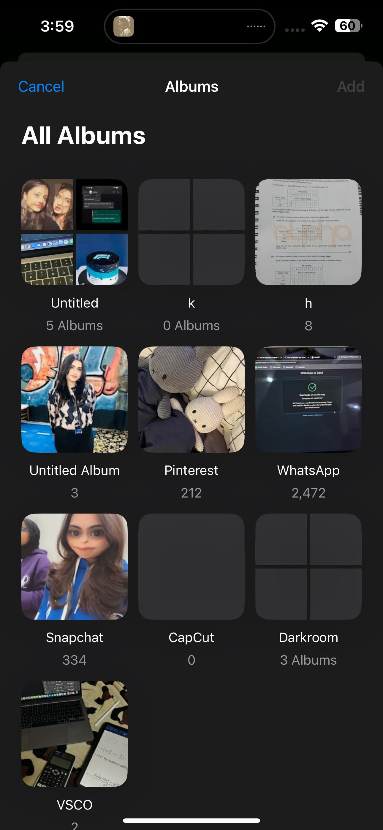 Danh sách các album trong ứng dụng Ảnh trên iPhone, hiển thị tùy chọn tạo thư mục mới để nhóm album