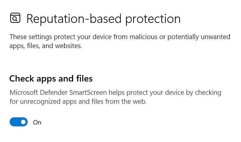 Giao diện cài đặt Windows SmartScreen trong phần 'App &amp; browser control', cho thấy các tùy chọn bảo vệ dựa trên danh tiếng được bật, giúp phát hiện phần mềm độc hại.