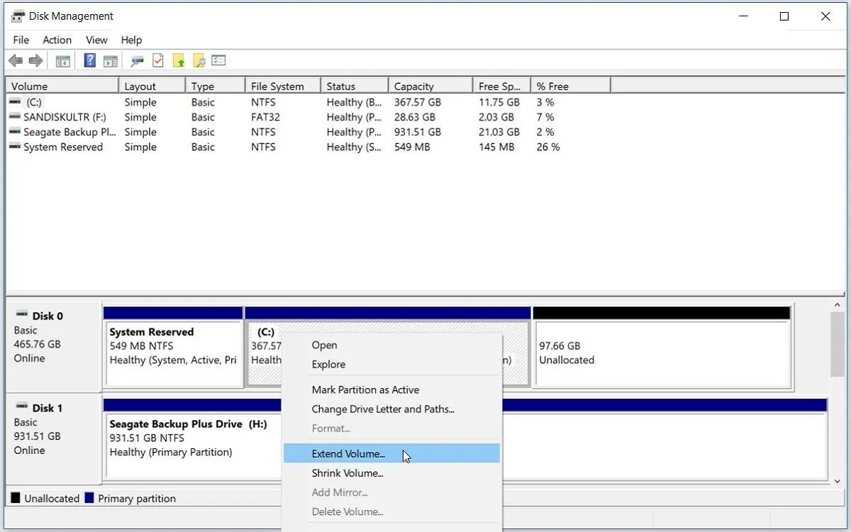 Giao diện Disk Management trong Windows thể hiện việc mở rộng phân vùng ổ C, minh họa sự rắc rối của việc quản lý phân vùng