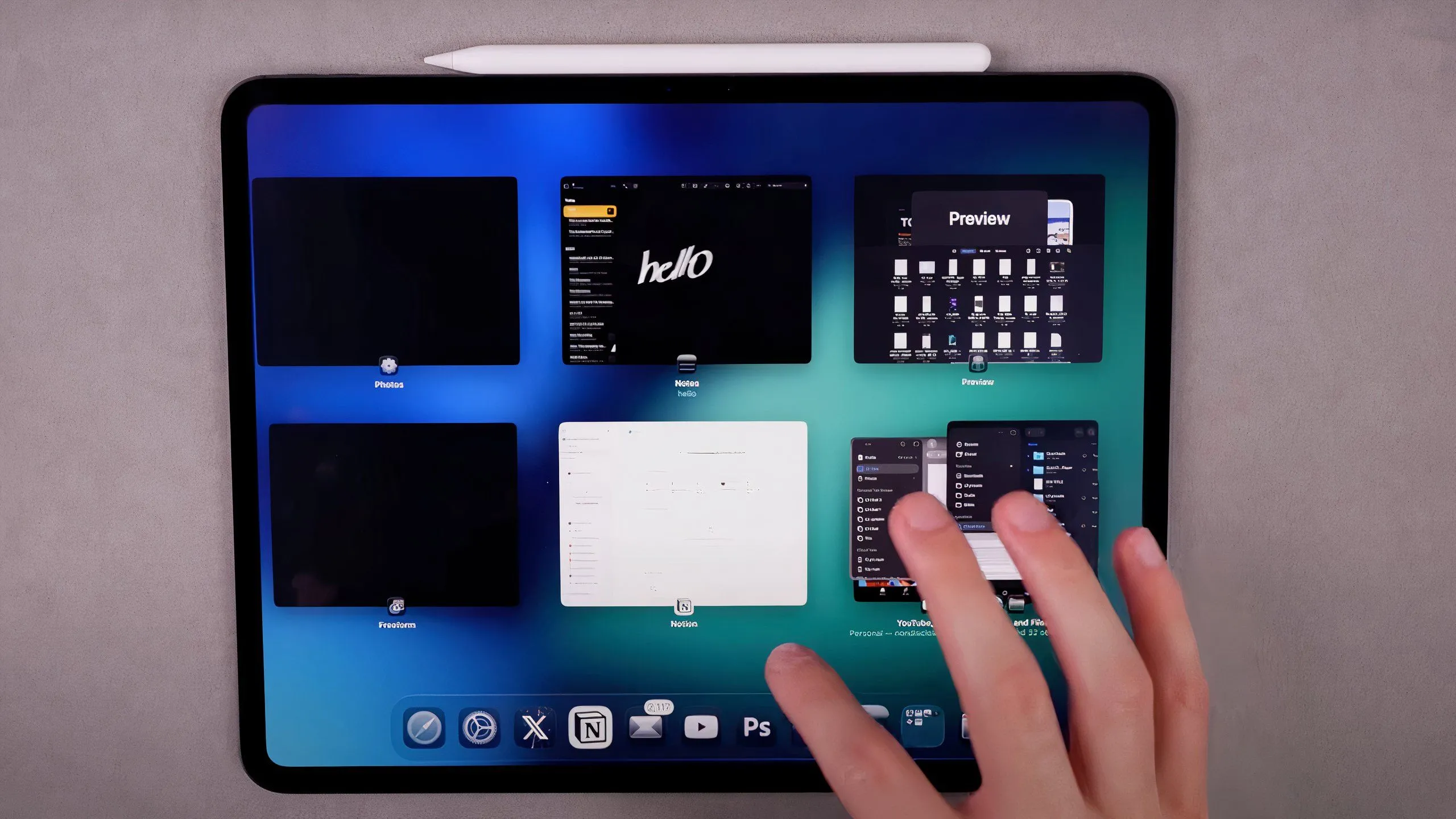 Giao diện Exposé trên iPadOS 26, hiển thị tất cả các cửa sổ ứng dụng đang mở để chuyển đổi nhanh chóng