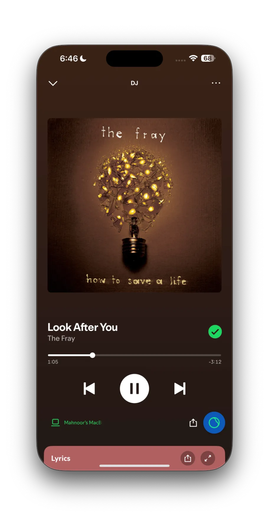 Giao diện phát nhạc của Spotify AI DJ với bài hát &quot;Look After You&quot; của The Fray, kèm nút điều khiển DJ.