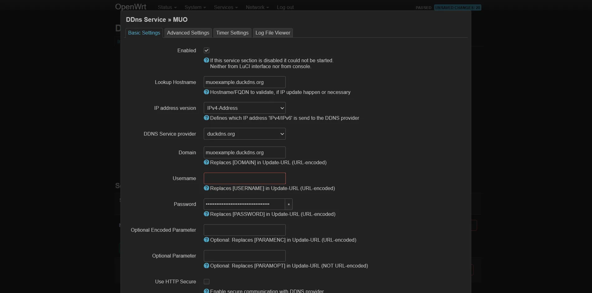 Màn hình cấu hình dịch vụ Dynamic DNS (DDNS) cho DuckDNS trên giao diện quản lý OpenWrt, bao gồm các trường Hostname, Password (API token) và IP Address Source.