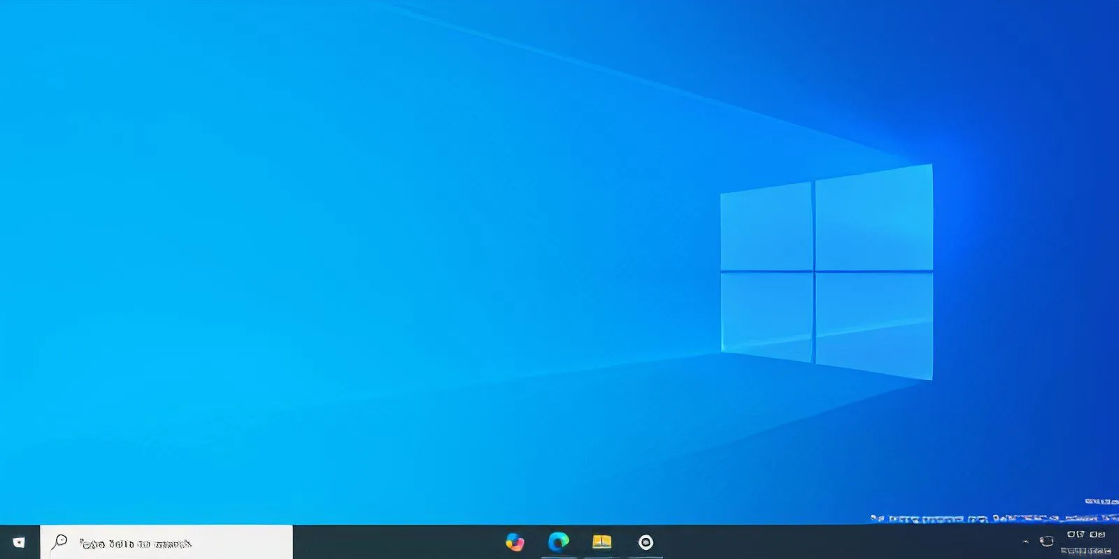 Màn hình nền Windows 10 với biểu tượng ứng dụng căn giữa trên thanh tác vụ nhờ TaskbarX