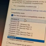 Menu thả xuống hiển thị các tùy chọn phiên bản Windows trong cài đặt Chế độ tương thích trên Windows 11