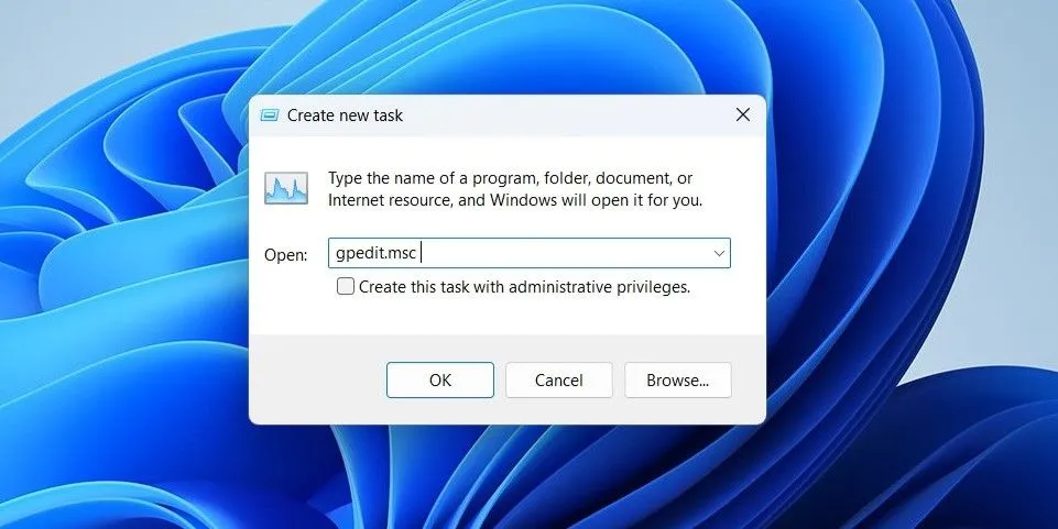 Sử dụng Task Manager để khởi chạy Local Group Policy Editor