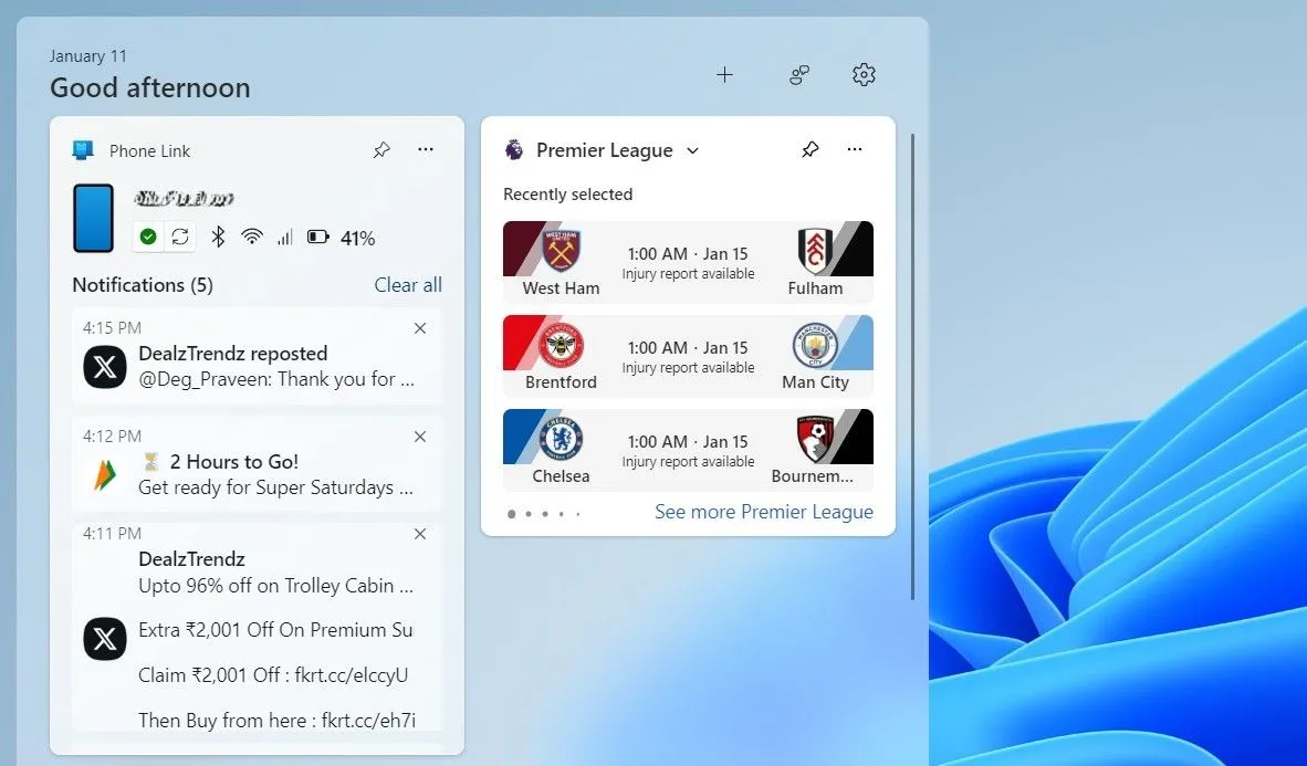 Widget Phone Link trên bảng tiện ích Windows 11 hiển thị trạng thái pin điện thoại và thông báo.